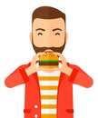 Man eating hamburger