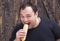 Man eating a hot dog