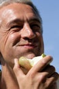 Man eating pear Royalty Free Stock Photo