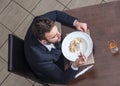 Man Eating Penne Pasta