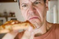 Man Eating Pepperoni Pizza