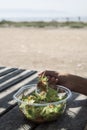 Man eating a prepared salad outdoors Royalty Free Stock Photo