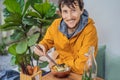 Man eating Raw Organic Poke Bowl with Rice and Veggies close-up on the table. Top view from above horizontal Royalty Free Stock Photo