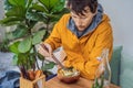 Man eating Raw Organic Poke Bowl with Rice and Veggies close-up on the table. Top view from above horizontal Royalty Free Stock Photo