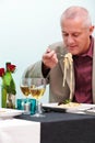 Man eating in a restaurant Royalty Free Stock Photo