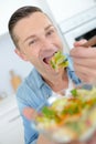 man eating salad Royalty Free Stock Photo