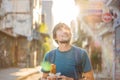 Man eating street food in Istanbul. Balik ekmek - fish in a bread, traditional Turkish fast food. Istanbul, Turkey Royalty Free Stock Photo