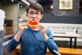 Man eating sweet watermelon