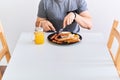 Man eating traditional full English breakfast Royalty Free Stock Photo