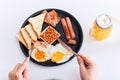 Man eating traditional full English breakfast Royalty Free Stock Photo