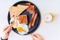 Man eating traditional full English breakfast Royalty Free Stock Photo