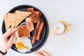 Man eating traditional full English breakfast Royalty Free Stock Photo