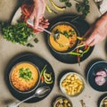 Man eating turkish traditional lentil soup Mercimek with pickled peppers Royalty Free Stock Photo