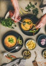 Man eating turkish traditional lentil soup Mercimek with pickled peppers Royalty Free Stock Photo