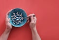 Man eating white - blue pills. View from first person Royalty Free Stock Photo
