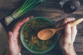 Man eats mushroom soup Royalty Free Stock Photo