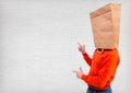Man in ecological paper bag on head Royalty Free Stock Photo