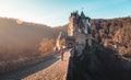 Man at Eltz Castle at sunrise, Rheinland-Pfalz, Germany