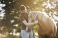 Man embracing of therappy horse Royalty Free Stock Photo