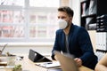 Man Employee In Office Wearing Face Mask Working Royalty Free Stock Photo