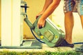 Man emptying caravan tank toilet cassette in dump station Royalty Free Stock Photo