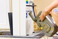 Man emptying caravan tank toilet cassette in dump station Royalty Free Stock Photo