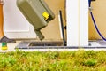 Man emptying caravan tank toilet cassette in dump station Royalty Free Stock Photo