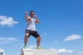 Man engaged in karate against the sky Royalty Free Stock Photo