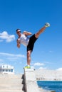 Man engaged in karate against the sky Royalty Free Stock Photo