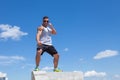 Man engaged in karate against the sky Royalty Free Stock Photo