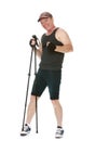 The man is engaged in Nordic walking Royalty Free Stock Photo