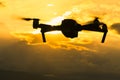 Silhouette of flying drone on sky Royalty Free Stock Photo