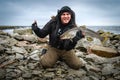 Man enjoy sea trout winter fishing Royalty Free Stock Photo