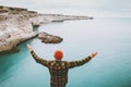 Man enjoying cold sea view alone raised hands Royalty Free Stock Photo