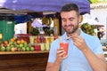 Man enjoying a fruit salad outdoors salpicon Royalty Free Stock Photo