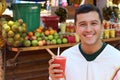 Man enjoying a fruit salad outdoors salpicon Royalty Free Stock Photo