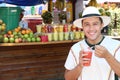 Man enjoying a fruit salad outdoors salpicon Royalty Free Stock Photo