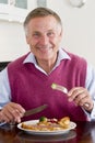 Man Enjoying Healthy meal, mealtime Royalty Free Stock Photo