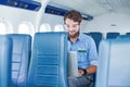 Man enjoying his journey by airplane Royalty Free Stock Photo