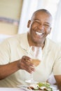 Man Enjoying meal, Mealtime With A Glass Of Wine Royalty Free Stock Photo