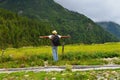 Man enjoying in nature and relishing it to the fullest in the foothills of Himalaya at Chitkul, Himachal, India