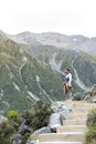 A man enjoying scenic view along the walking trail to the Blue Lakes and Tasman Glacier View, Aoraki / Mount Cook National Park Royalty Free Stock Photo