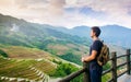 Man enjoying stunning Asian rice terrace scenery