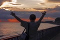 Man enjoys sunset on the sea Royalty Free Stock Photo