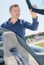 Man entering cockpit aircraft Royalty Free Stock Photo