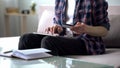 Man entering credit card data into tablet, paying for airline ticket, booking Royalty Free Stock Photo