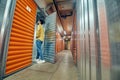 Man entering open garage door in warehouse