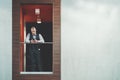 Man entrepreneur on office balcony Royalty Free Stock Photo