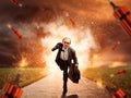 Man escaping from dynamite exploding Royalty Free Stock Photo