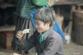 Man of ethnic minorities are eating ice cream, at old Van market